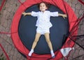 Girl in the trampoline