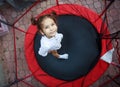 Girl in the trampoline