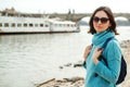 Girl traveler enjoying great view on Prague city. Stylish woman with backpack travel in europe Royalty Free Stock Photo