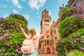 Girl traveler enjoys a view of the town hall building in SaarbrÃÂ¼cken. Travel in Germany concept