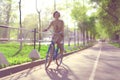 Girl traveling on bike Royalty Free Stock Photo