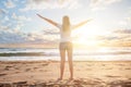 Girl traveller in a morning sun dawn on a tropical beach resert. Beautiful woman enjoys her summer vacation, sea. sun and beach