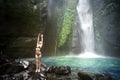 Girl travels to waterfalls in Indonesia, Bali