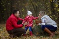 Girl treats her mother autumn berries