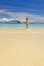 Girl on a tropical beach Royalty Free Stock Photo