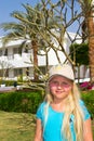 Girl among tropical plants Royalty Free Stock Photo