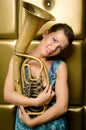 The girl with a tuba Royalty Free Stock Photo