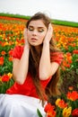 Girl in tulips field