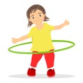 The girl turns the hula hoop. The little girl is charging and turns the hula hoop. Royalty Free Stock Photo