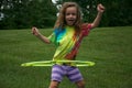 Girl Twirling a Hula Hoop Royalty Free Stock Photo