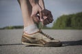 Girl tying shoelace before jogging Royalty Free Stock Photo