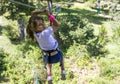 Girl in tyrolean traverse Royalty Free Stock Photo