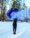 A girl with an umbrella and colored smoke. Colored smoke. A checker with colored smoke. Royalty Free Stock Photo