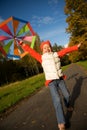 Girl with umbrella in a forest