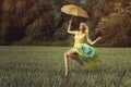 Girl with an umbrella levitates