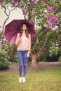 Girl with umbrella in park