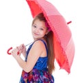 Girl with umbrella posing in studio. Royalty Free Stock Photo