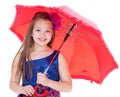 Girl with umbrella posing in studio. Royalty Free Stock Photo