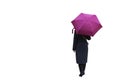 A girl with an umbrella on a white background is standing with her back