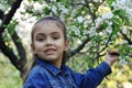 Girl under blooming spring tree Royalty Free Stock Photo