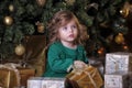 Girl under the Christmas tree Royalty Free Stock Photo