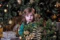 Girl under the Christmas tree Royalty Free Stock Photo