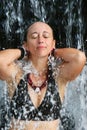 Girl Under Relaxing Waterfall