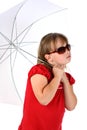 Girl under umbrella with dark sunglasses on white