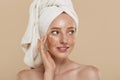 Girl with undereye patches and towel on head Royalty Free Stock Photo