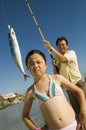 Girl Unhappy With Father's Catch