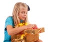 Girl unpacking her gifts Royalty Free Stock Photo