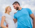 Girl and unshaven macho hugs. Woman fall in love with new boyfriend. She made her choice. Start romantic relationships Royalty Free Stock Photo