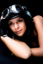 Girl with US Army-style motorcycle helmet Royalty Free Stock Photo