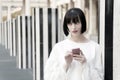 Girl use mobile phone in paris, france Royalty Free Stock Photo