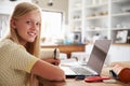 Girl using laptop computer at home Royalty Free Stock Photo
