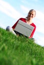 Girl using laptop outdoors Royalty Free Stock Photo