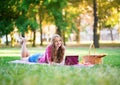 Girl using laptop in a park Royalty Free Stock Photo