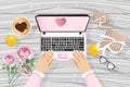 Girl using laptop with romantic gifts site