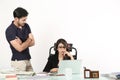 Girl is using laptop sitting on the chair and boy standing Royalty Free Stock Photo