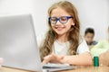 Girl using modern computer during lesson at school Royalty Free Stock Photo