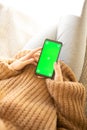 Girl Using Smartphone with chroma key screen