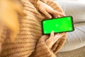 Girl Using Smartphone with chroma key screen