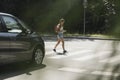 Girl using smartphone while walking Royalty Free Stock Photo