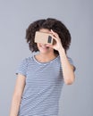 Girl using virtual reality device cardboard Royalty Free Stock Photo