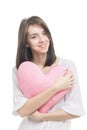 Girl with valentine pink pillow heart