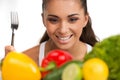 Girl with vegetables isolated on white background. Royalty Free Stock Photo