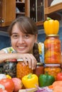 Girl with vegetables and jars Royalty Free Stock Photo