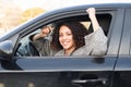 Girl happy after purchasing a new car Royalty Free Stock Photo