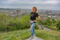 Girl with a view of Yerevan from Tsitsernakaberd-the Armenian genocide memorial complex is an official monument to the Royalty Free Stock Photo