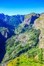 Girl at Viewpoint Eira do Serrado looking to Curral das Freiras village in the Nuns Valley in beautiful mountain scenery, Royalty Free Stock Photo